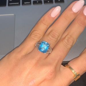 Blue topaz diamond ring